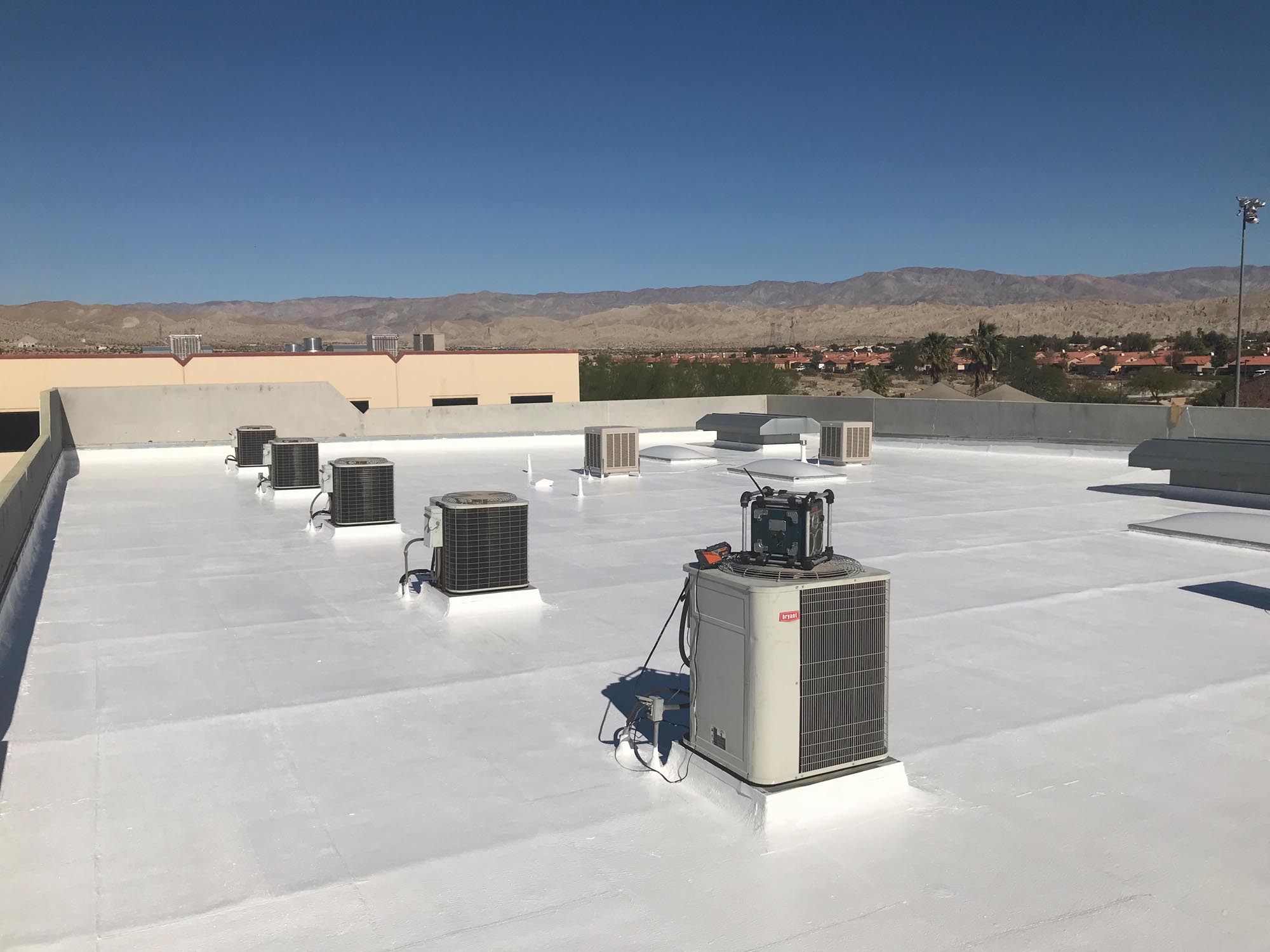 Out door ac units on a roof of a building